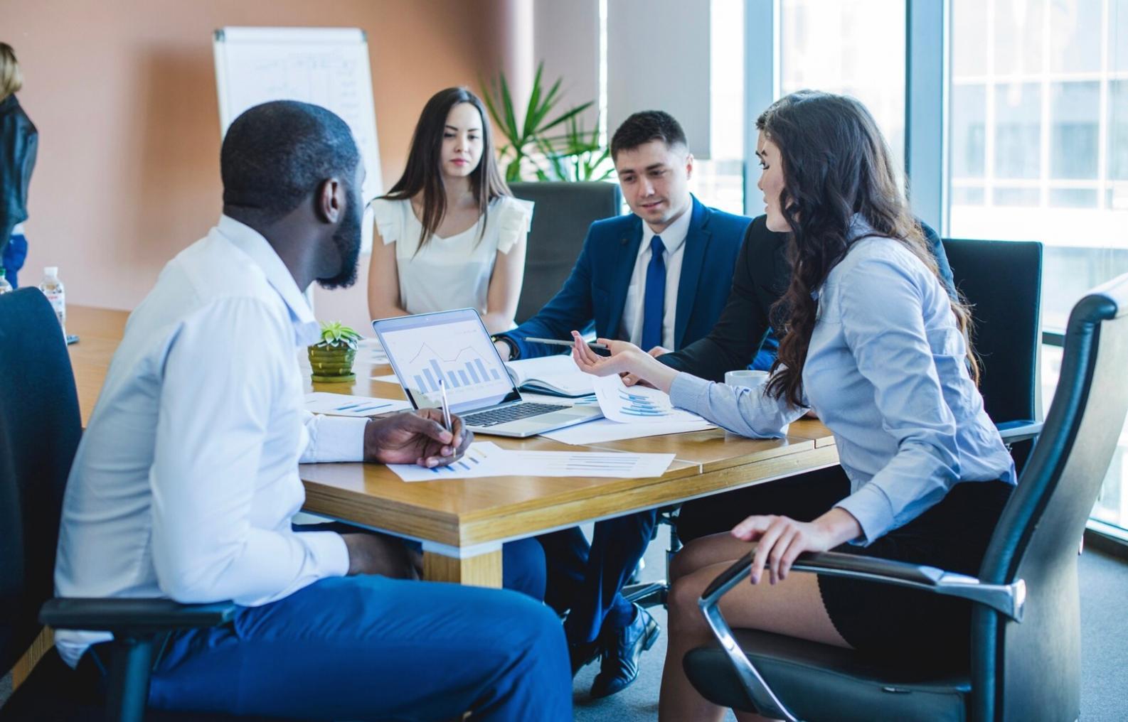 Financial planning workspace with calculator and budget charts